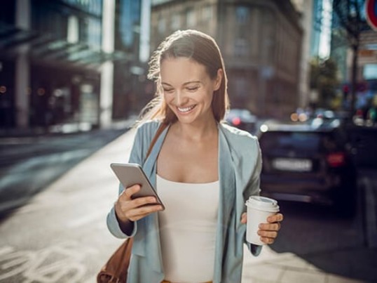 young woman with coffee-to-go