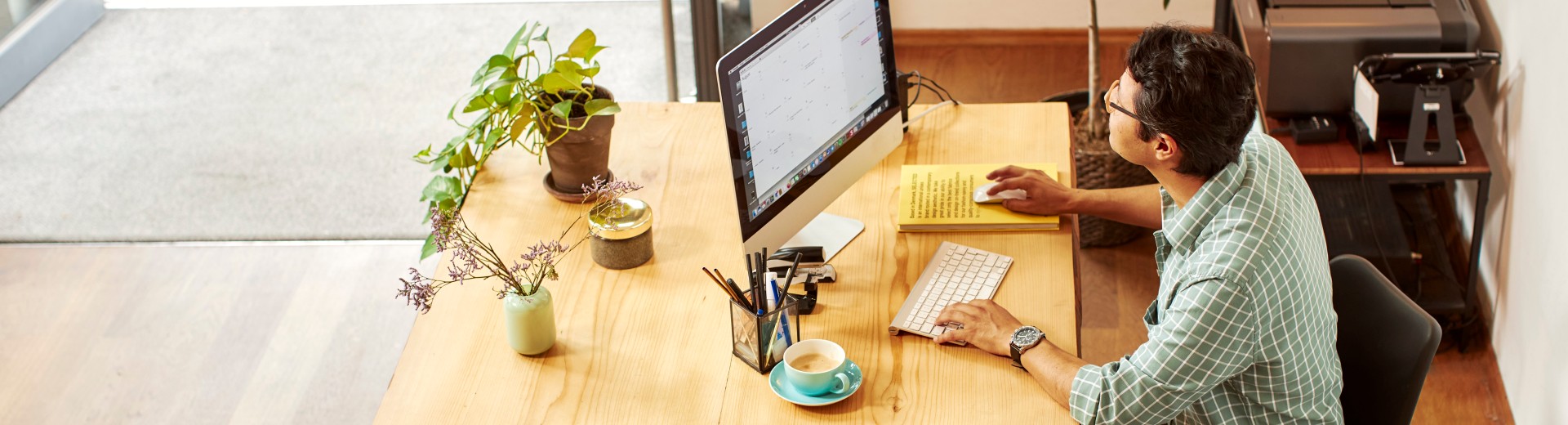Person at desk with PC