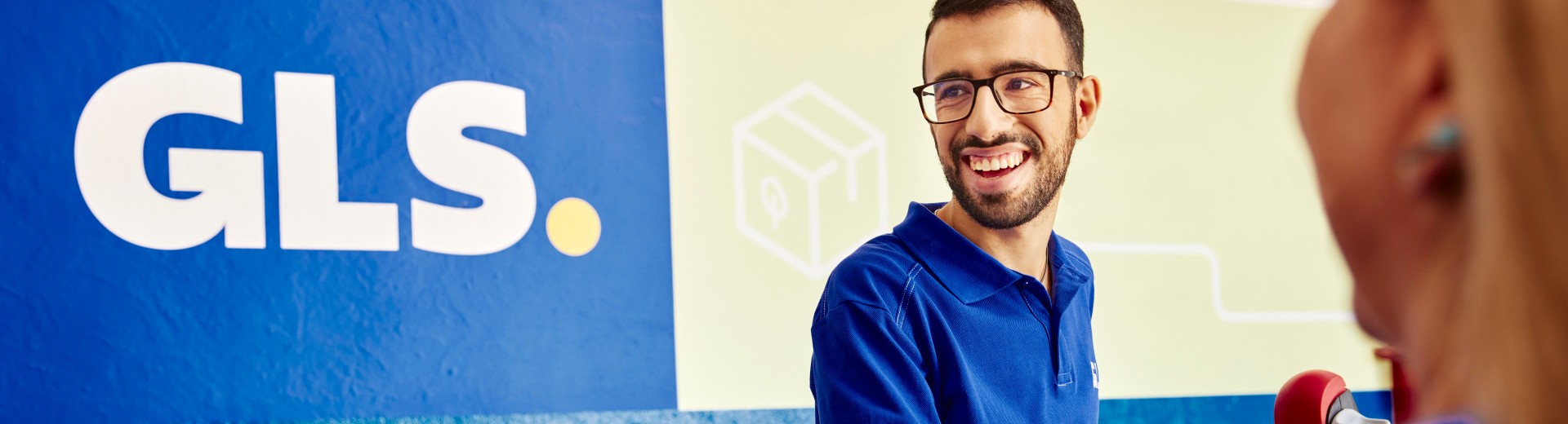GLS employee wearing a blue polo shirt