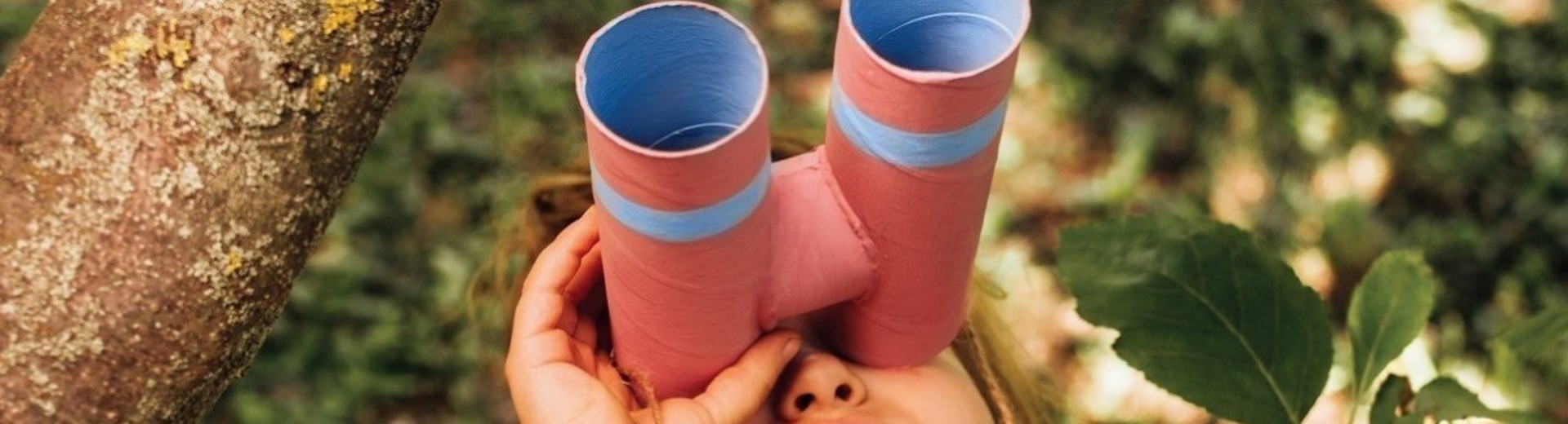 Girl with crafted binoculars
